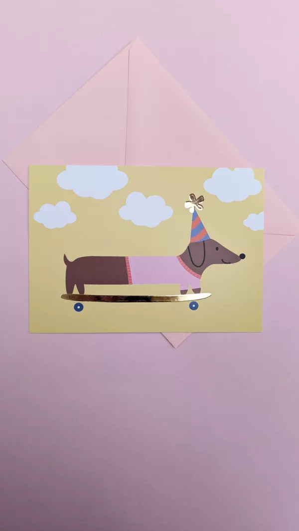 Carte postale - Teckel en skate